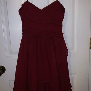 Maroon strapless dress with bow on front